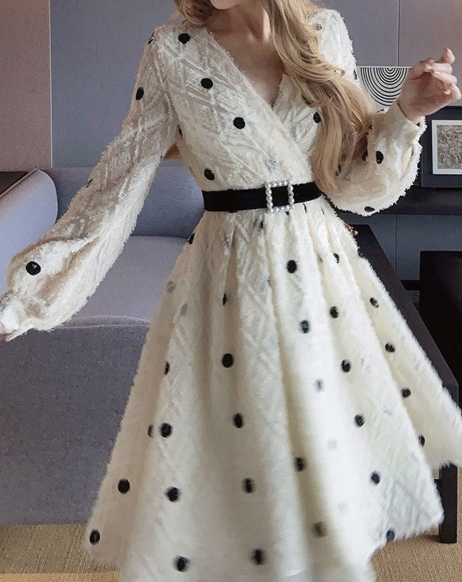 Women's black and white polka dot swing dress