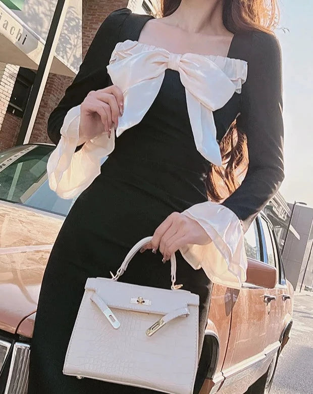 Women's black and white bow long sleeve dress