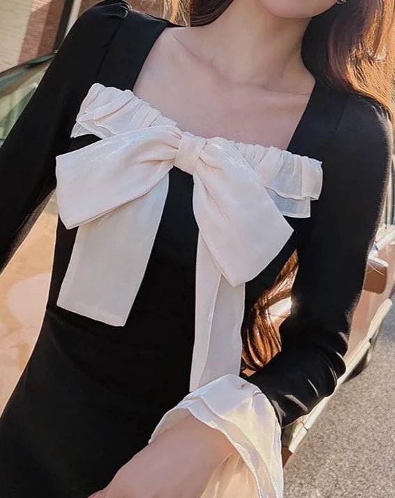 Women's black and white bow long sleeve dress