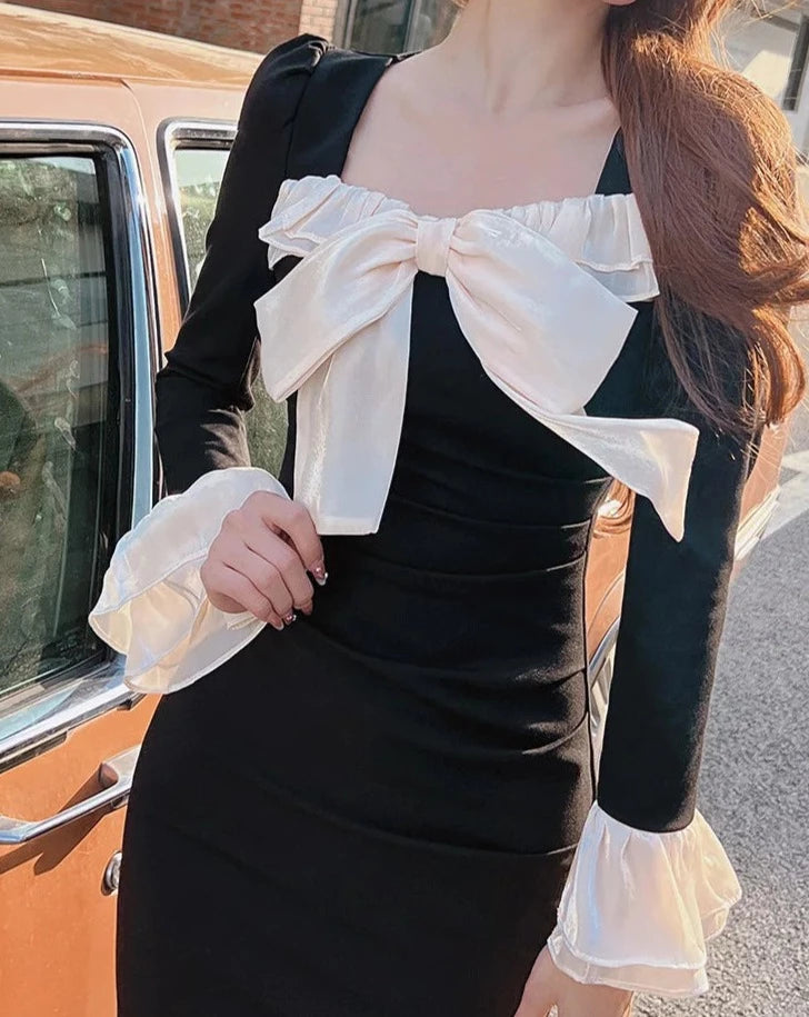 Women's black and white bow long sleeve dress