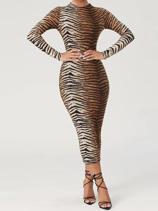 Woman wearing animal print bodycon long sleeve midi dress